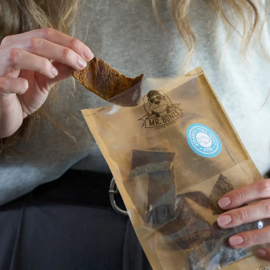 Bag of air-dried Atlantic tuna jerky for dogs, natural dental snack for all sizes