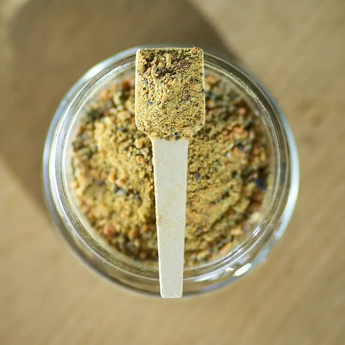 Glass jar with green lipped mussel topper for dogs and cats, natural joint health supplement.