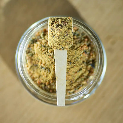 Glass jar with green lipped mussel topper for dogs and cats, natural joint health supplement.