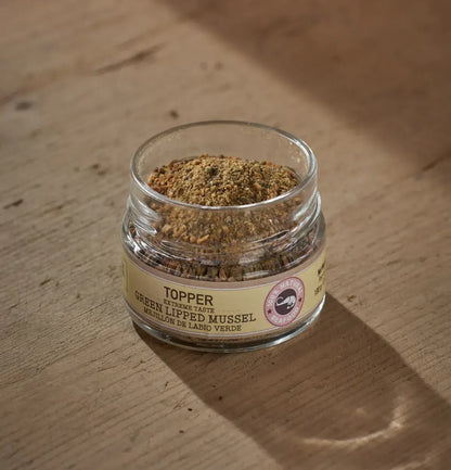 Glass jar with green lipped mussel topper for dogs and cats, natural joint health supplement.